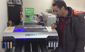 Spiros Tolios from Greece , WER-D4880UV desktop uv printer with free RIP software and installation