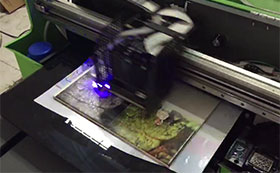 Iran customers check the printing result of wer a2 uv printer